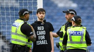 Protester ties himself to goalpost to delay Scotland-Israel women's football match
