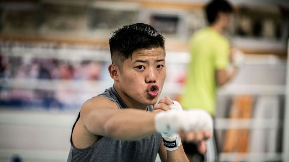 Top Japanese fighter retires to support comatose boxer brother