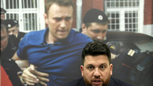 Russia sentences in absentia Navalny ally to 18 years