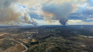 Canadian oil city lifts wildfire evacuation orders