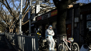 En restaurantes clandestinos y bares secretos los habitantes de Pek&iacute;n esquivan las normas covid