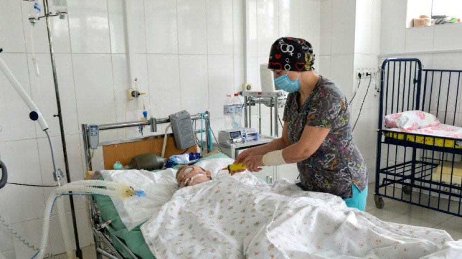 In Ukraine hospital, war-wounded children make slow recovery