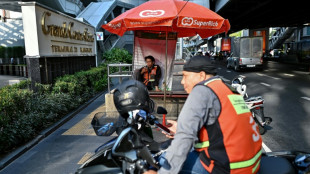 'Have to be outside': Thai delivery riders swelter in heatwave