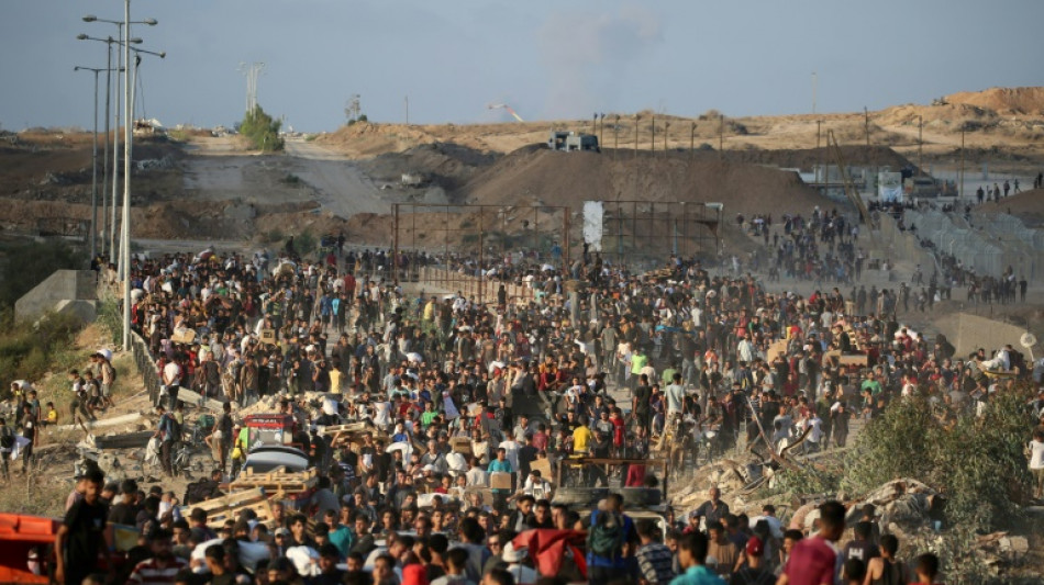 Spain PM alleges 'genocide' in Gaza as rescuers say 56 killed