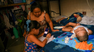 Kids study in overheated slum as Philippines shuts schools