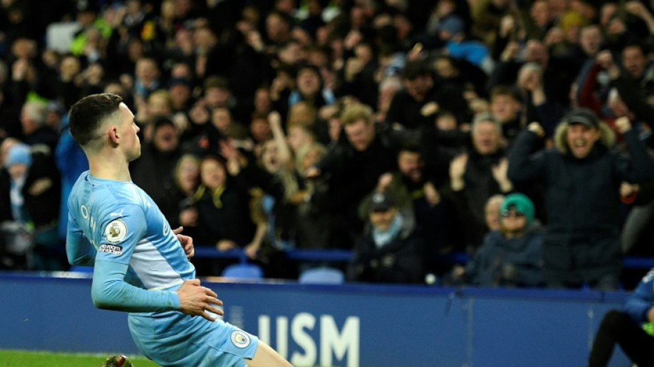 Man City survive Everton scare to go six points clear