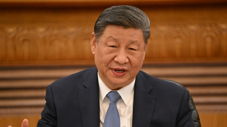 China's Xi warns foreign executives of 'severe' trade headwinds