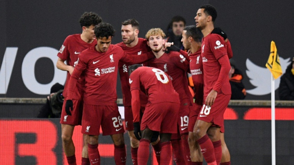 Elliott's rocket sends troubled Liverpool into FA Cup fourth round