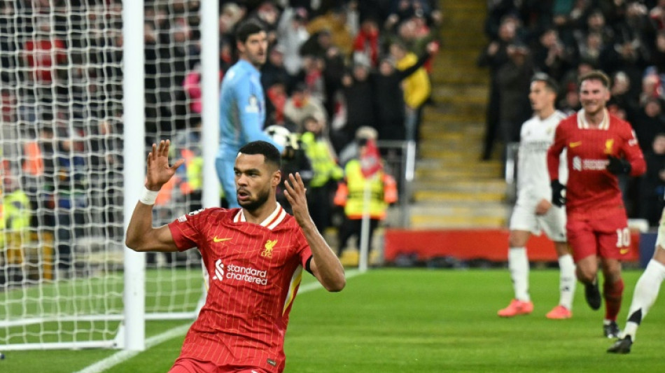Liverpool vence Real Madrid (2-0) e se mant&eacute;m 100% na Champions