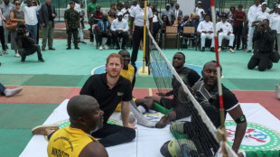 In Nigeria for Invictus, Prince Harry plays volleyball with veterans