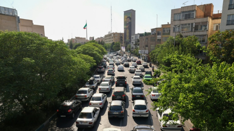 Tehranis caught between fear and resolve as air war intensifies