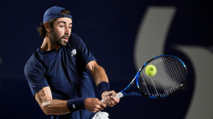 Thompson downs Ruud to win maiden ATP crown