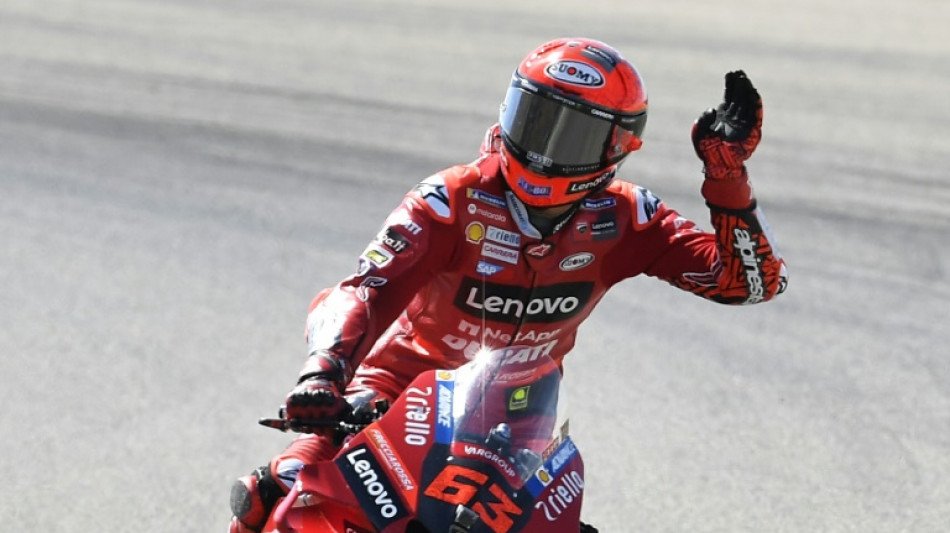 Bagnaia breaks lap record to take pole in Aragon MotoGP
