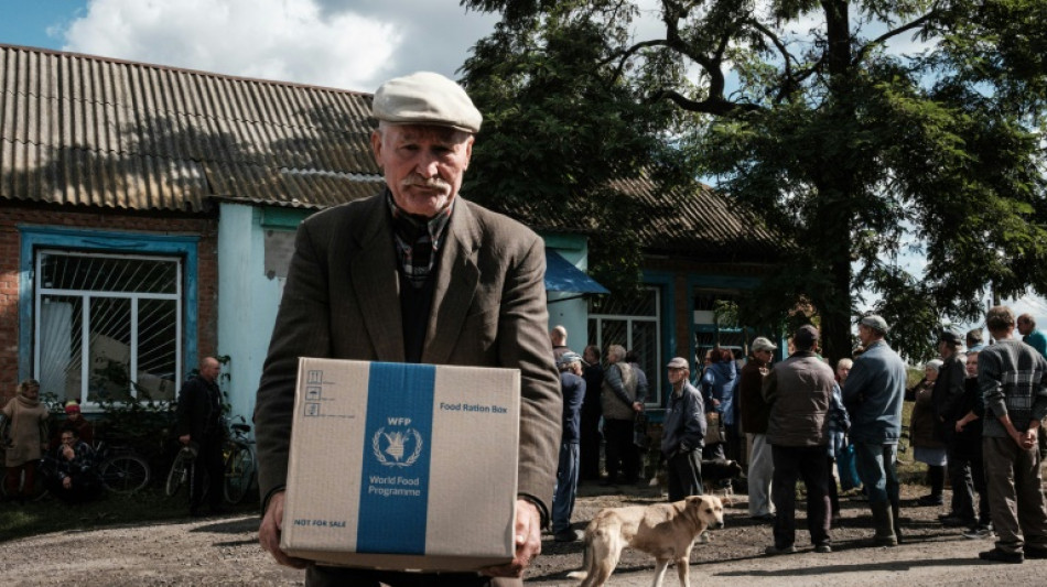 War leaves Ukraine farming village queueing for food