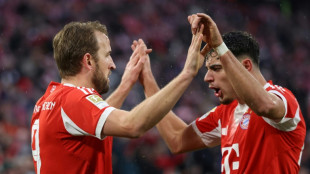 Kane helps Bayern extend Bundesliga lead as Dortmund held by Leipzig