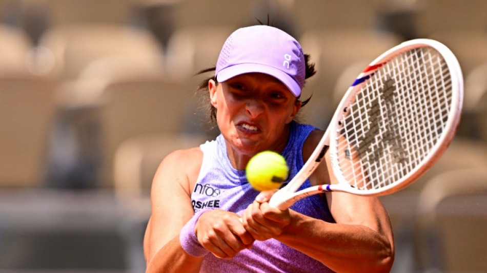 Reigning champion Swiatek sets up French Open semi clash with Sabalenka