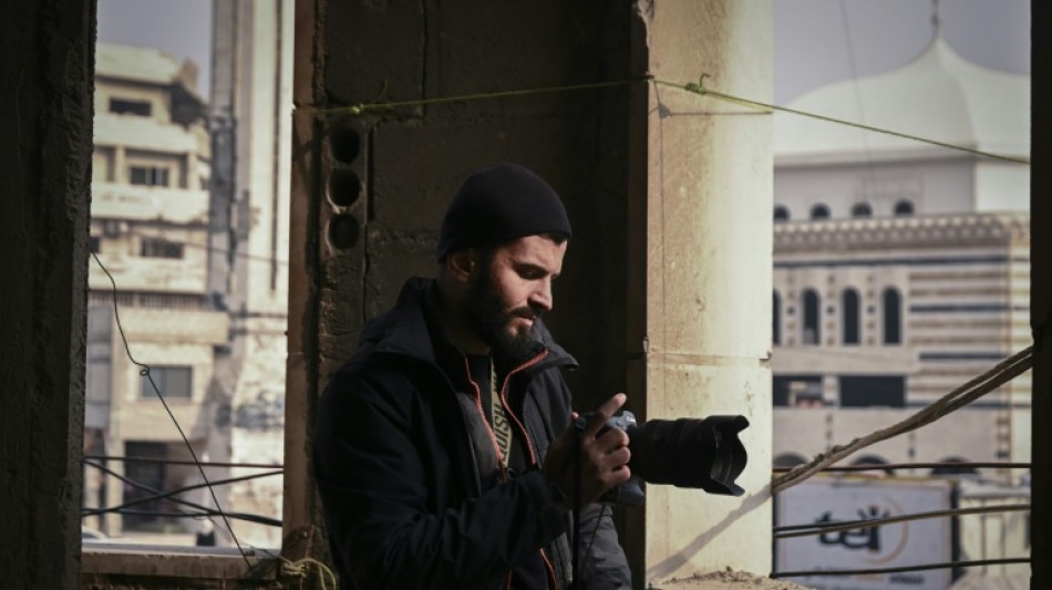 Pour le photographe de l'AFP Sameer al-Doumy, un retour &eacute;mouvant dans sa ville syrienne