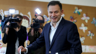 Portugal holds snap election with centre-right leading polls