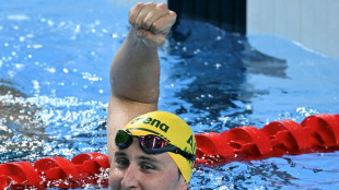 New dad McEvoy adds 'unreal' world swimming gold to Olympic title