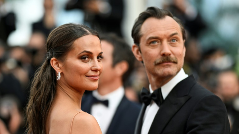 A Cannes, le duel des "rois" Jude Law et Johnny Depp