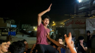 Gazat&iacute;es reaccionan euf&oacute;ricos al anuncio de acuerdo para terminar la guerra