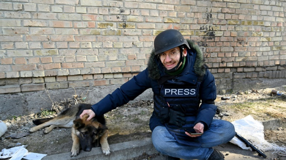 Macron pays tribute to slain AFP reporter Arman Soldin