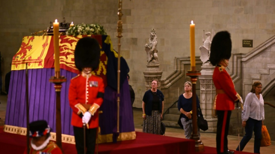 Tears as British public pays respects to queen's coffin