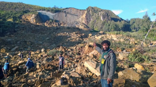 Rescue teams arrive at site of massive landslide in Papua New Guinea