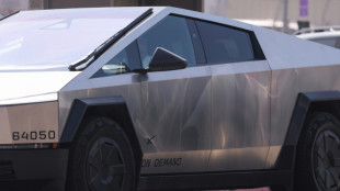 Tesla shares jump after global car sales top estimates
