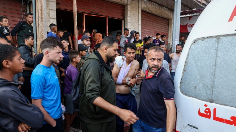 Gaza rescuers say Israeli fire kills 31 near aid site
