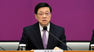 Hong Kong leader defends foreign trade offices after UK spying arrests