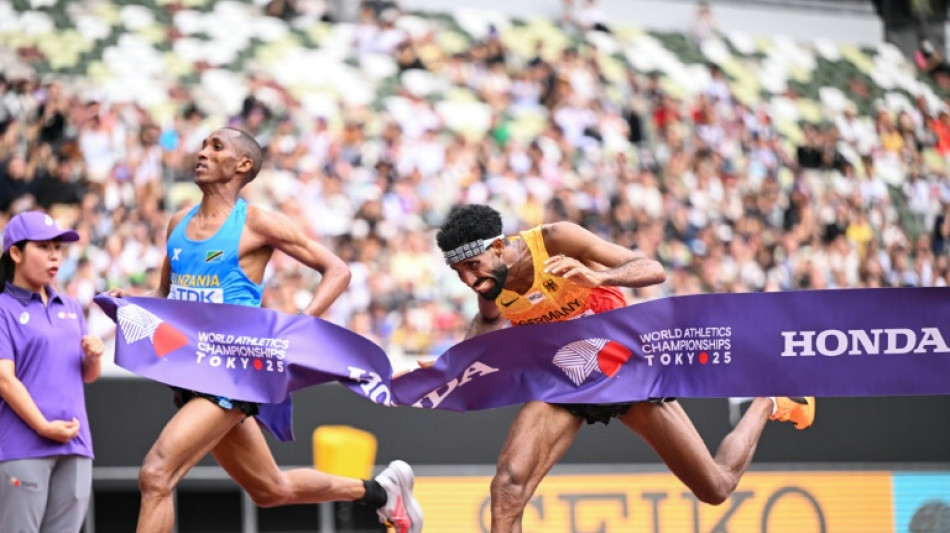 First-ever Tanzanian gold as Simbu dips past Petros in world marathon