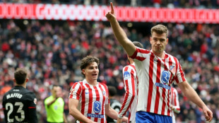 Atletico down Mallorca to tighten grip on third