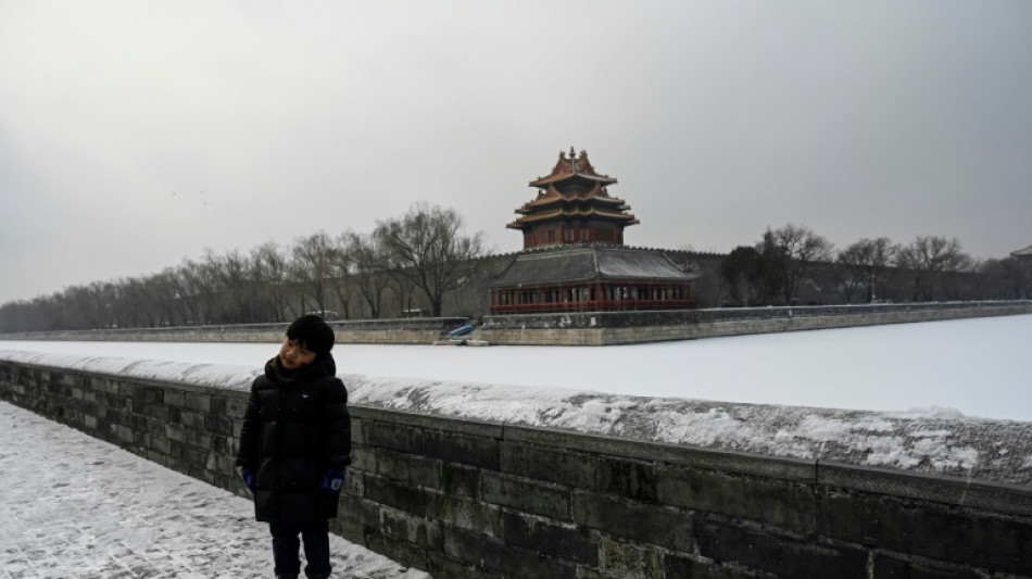 Snow falls on Chinese capital as two-week Olympics countdown starts