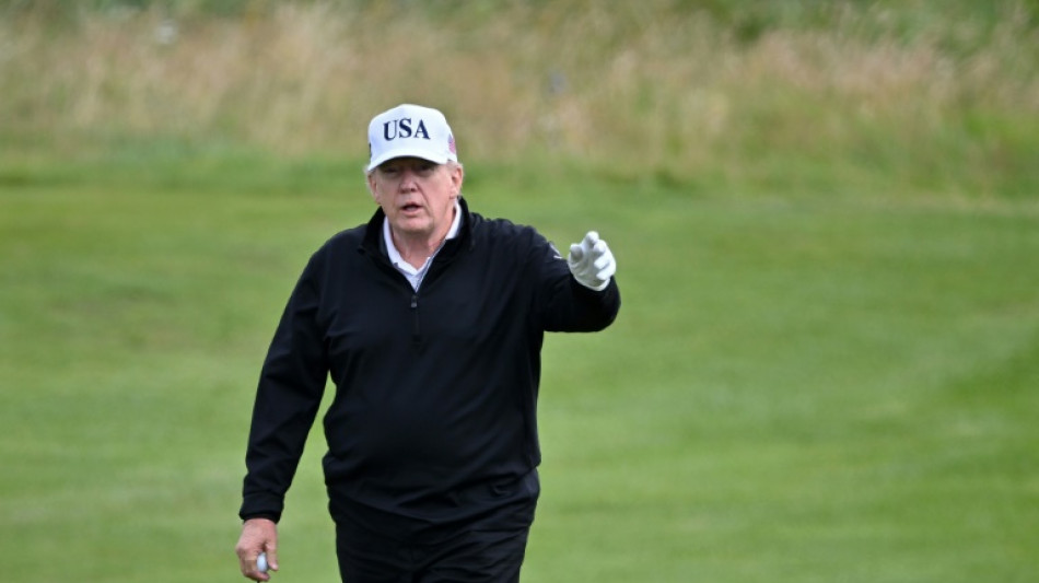 Trump plays golf in Scotland as protesters rally