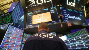 Wall Street h&eacute;site, entre r&eacute;sultats de la tech et n&eacute;gociations commerciales