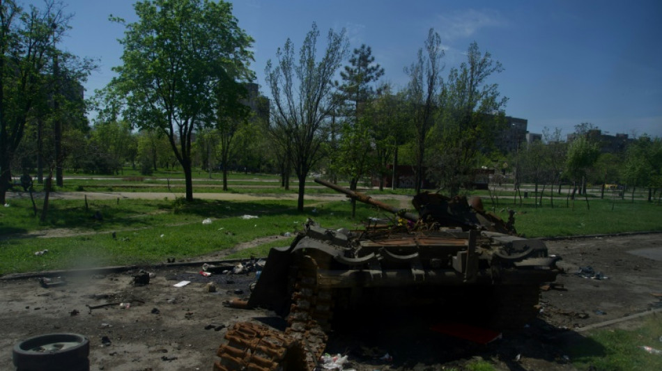Explosions still echo in Ukraine's devastated port of Mariupol