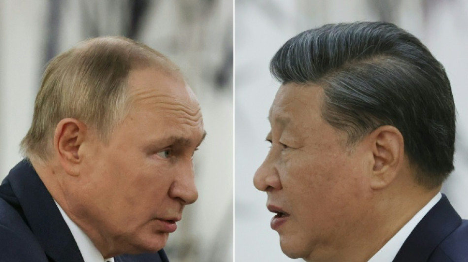 Putin, Xi hail 'great power' ties at talks defying West
