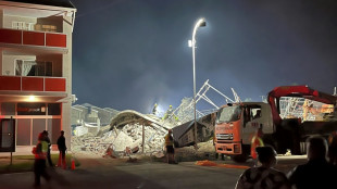 S.Africa building collapse kills two, traps dozens: police
