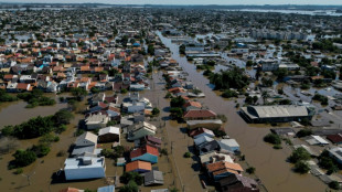 Brazilians queue for precious water as flood damage intensifies