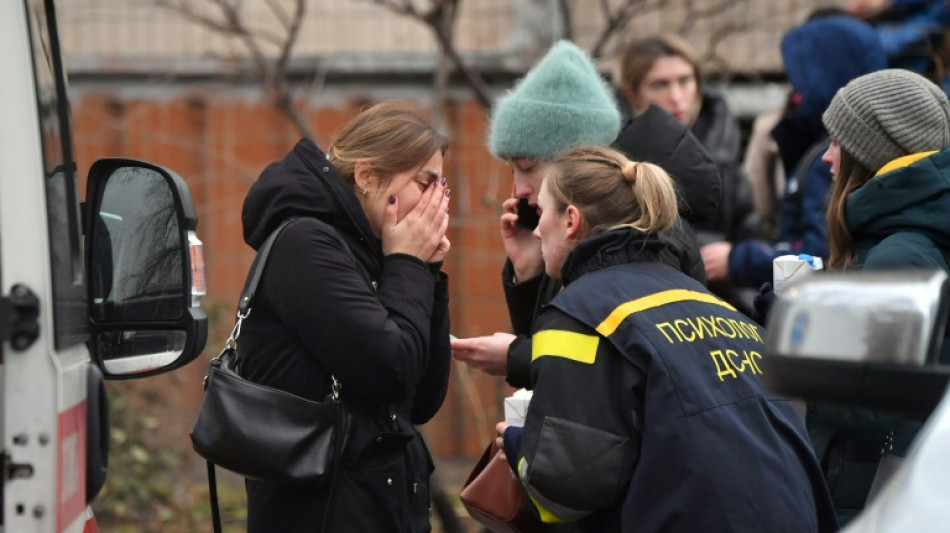 Body bags, blood and shock at Ukraine helicopter crash site
