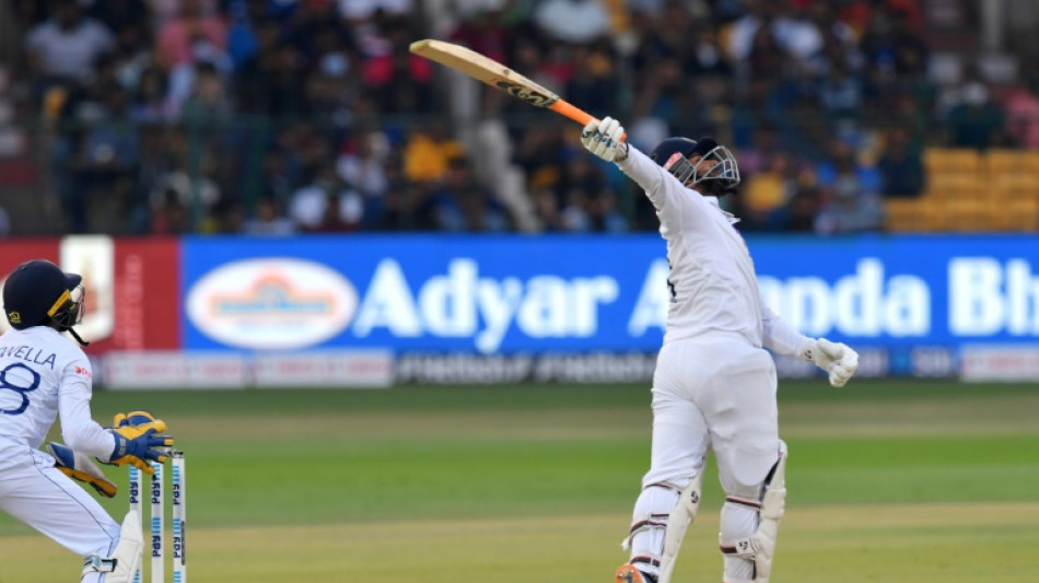 Pant smashes 50 as India build lead in pink-ball Test