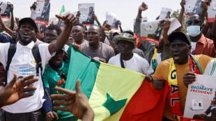Hundreds protest in Senegal demanding new election date