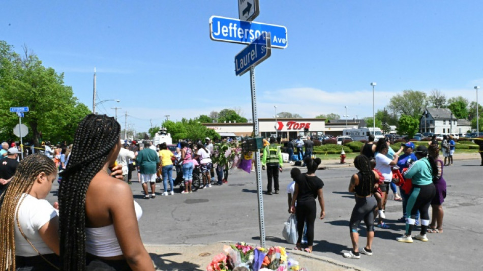 US shaken by racist mass shooting, weekend of gun violence 