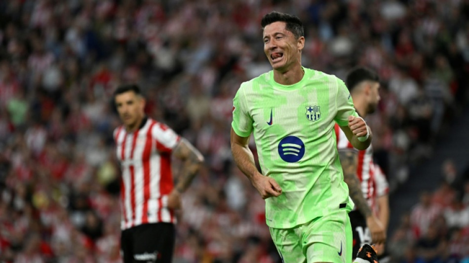 Lewandowski passes century as champions Barca sign off in style