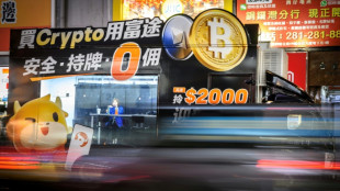 Stocks diverge as bitcoin hits record high