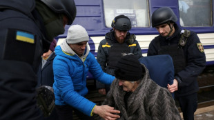 Evacuations, retreat in east Ukraine on war anniversary
