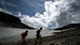 Runners take on Swiss glacier race despite melt