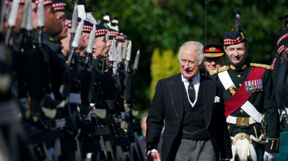 King Charles III leads queen's coffin procession in Scotland