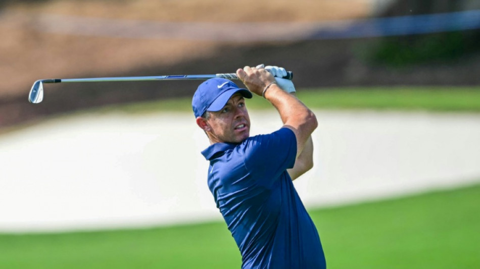 McIlroy shares lead with Race to Dubai title in sight